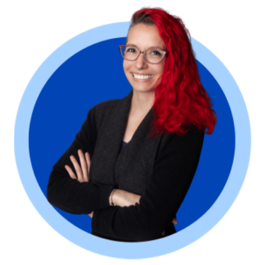Person with red hair and glasses