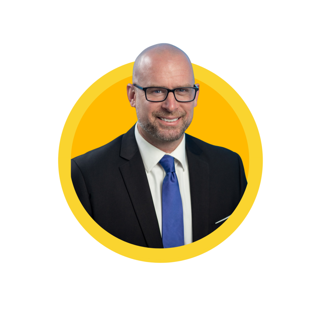 Smiling man in suit and glasses