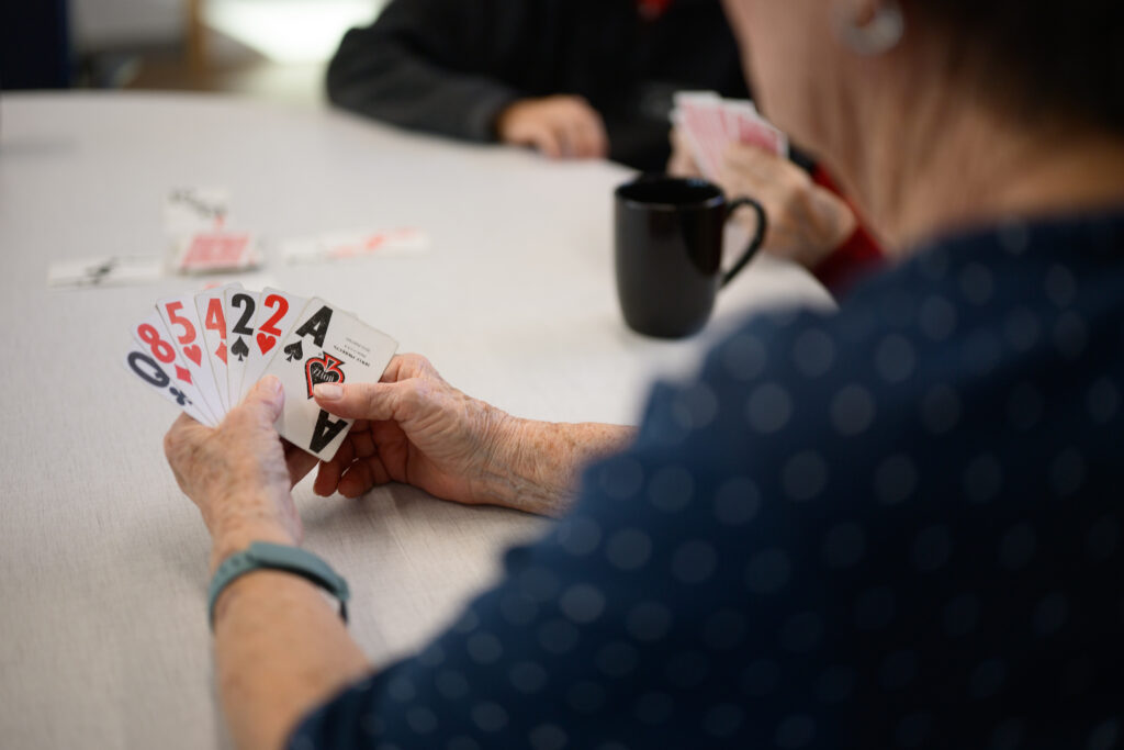 Playing cards at a table