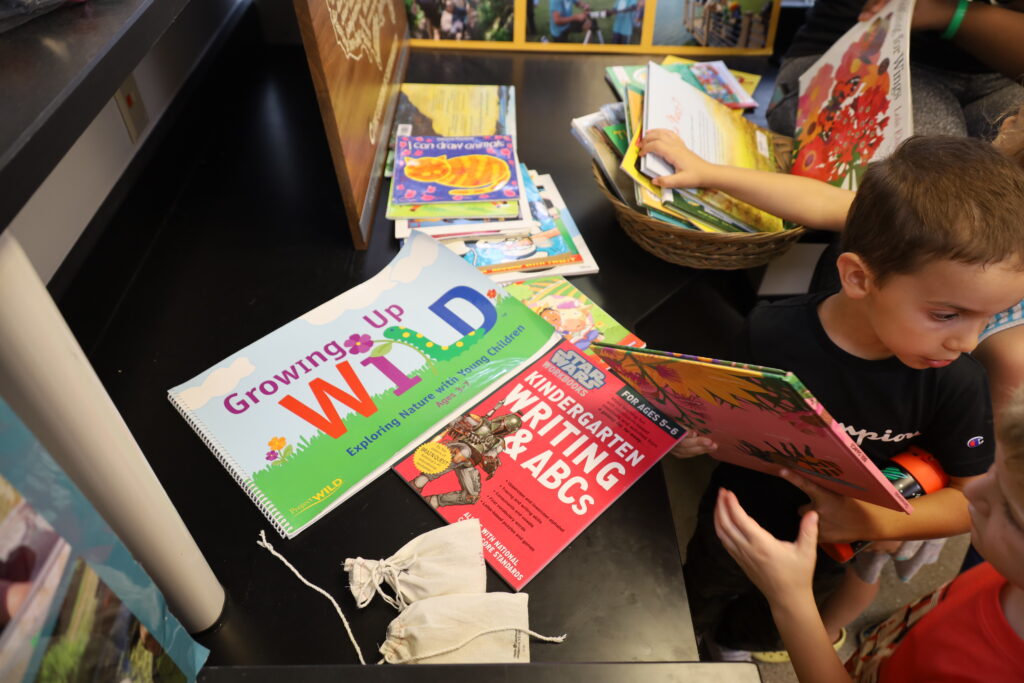 Children exploring books in library