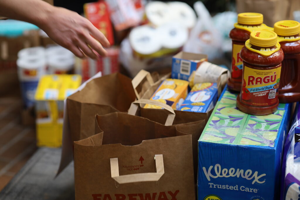 Groceries in paper bags and boxes
