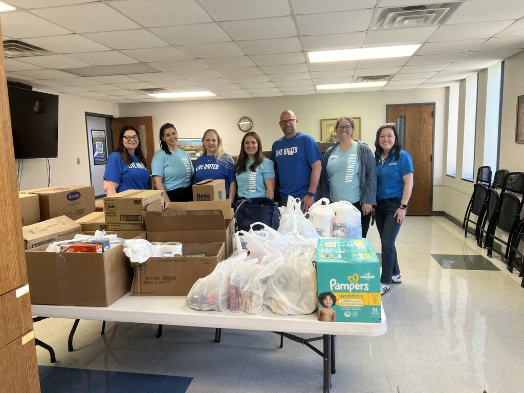 Group of volunteers with donations