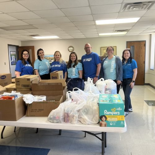 Group of volunteers with donations